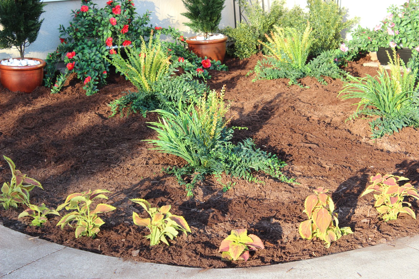 how to layout artificial plants for your flower bed