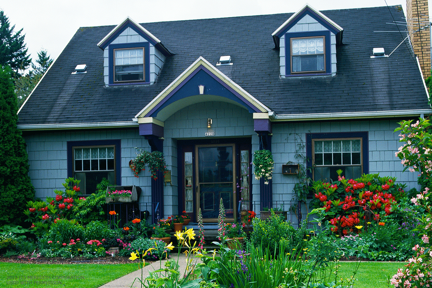 welcoming front-yard flower garden ideas - better homes and gardens