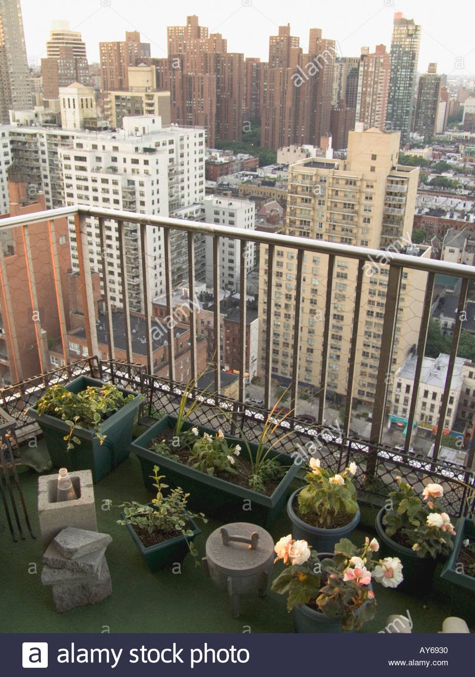 new york city residential balcony with flower garden stock photo