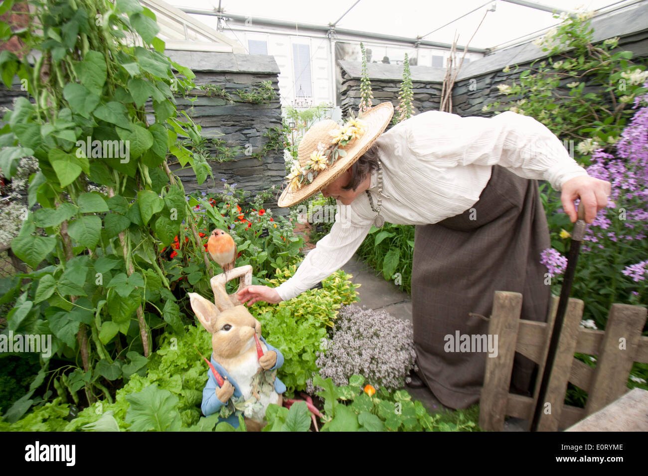 london uk. 19th may 2014. a woman dressed as english author beatrix
