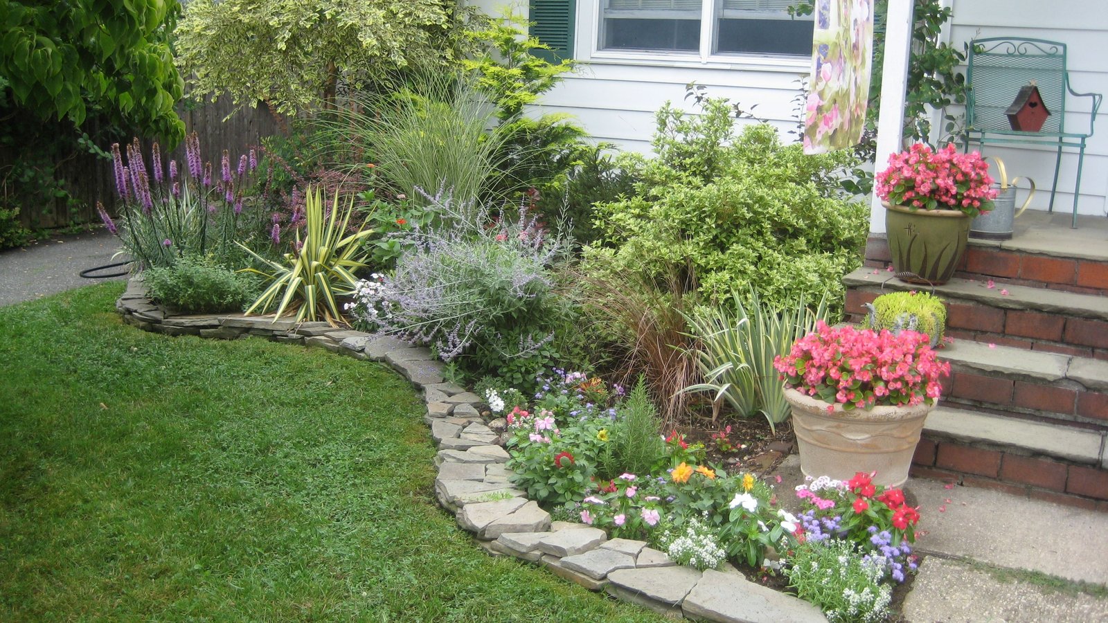 dry stack stone wall edging. | garden design - edging | garden