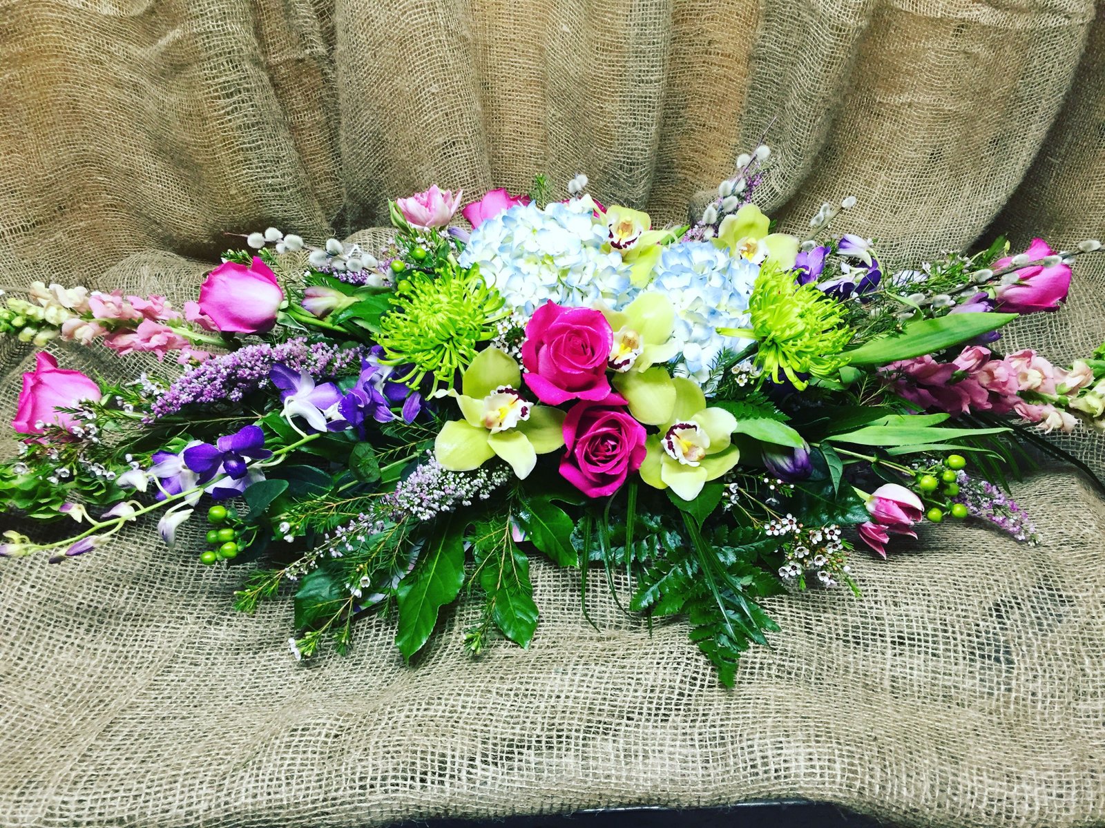 designers choice table centre piece with a variety of beautiful