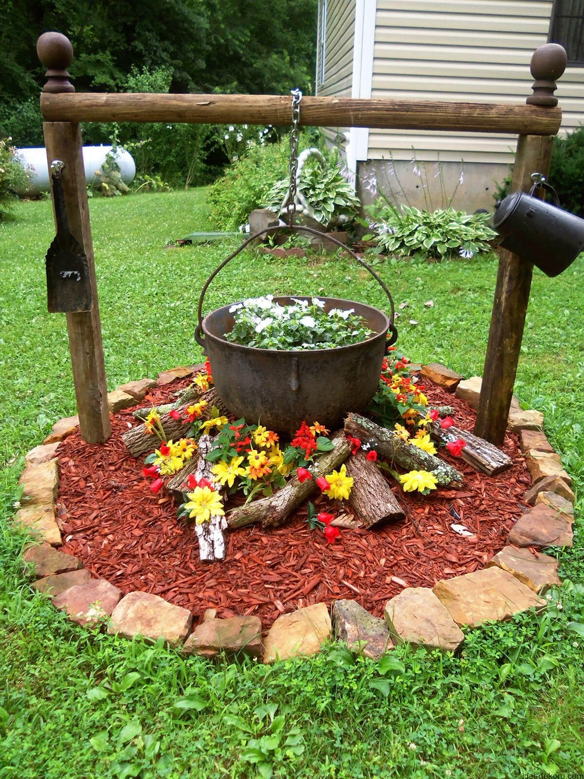 antique cauldron flower bed design | yard art | flower bed designs