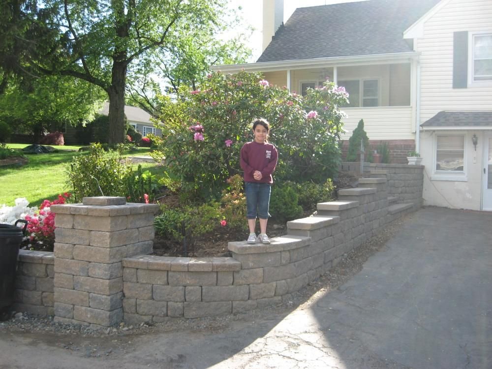 love this retaining wall idea for my driveway. looking to