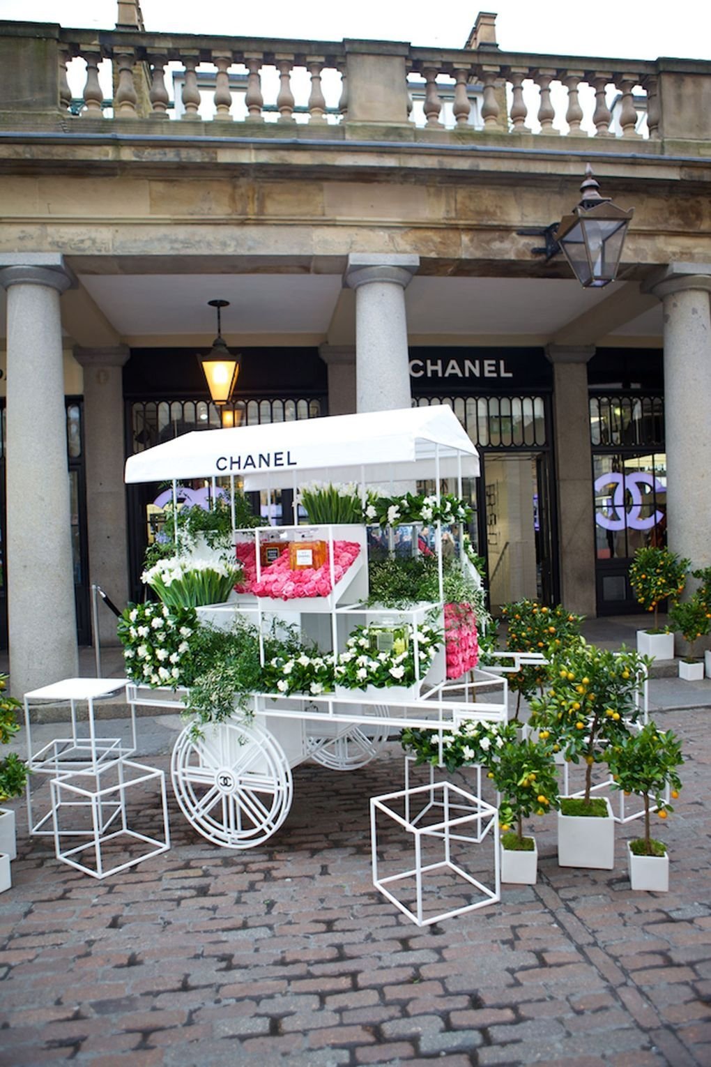 chanel's new nail bar opens | chanel | chanel flower, flower cart