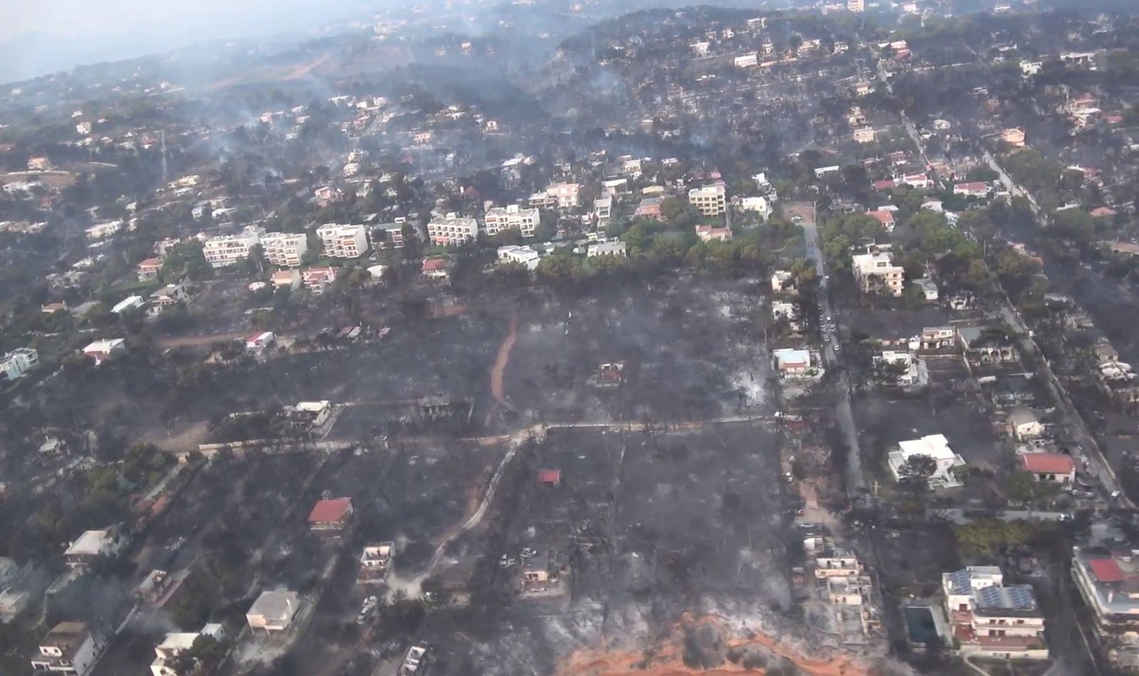 greece wildfires: at least 74 dead as blazes rage in holiday resorts