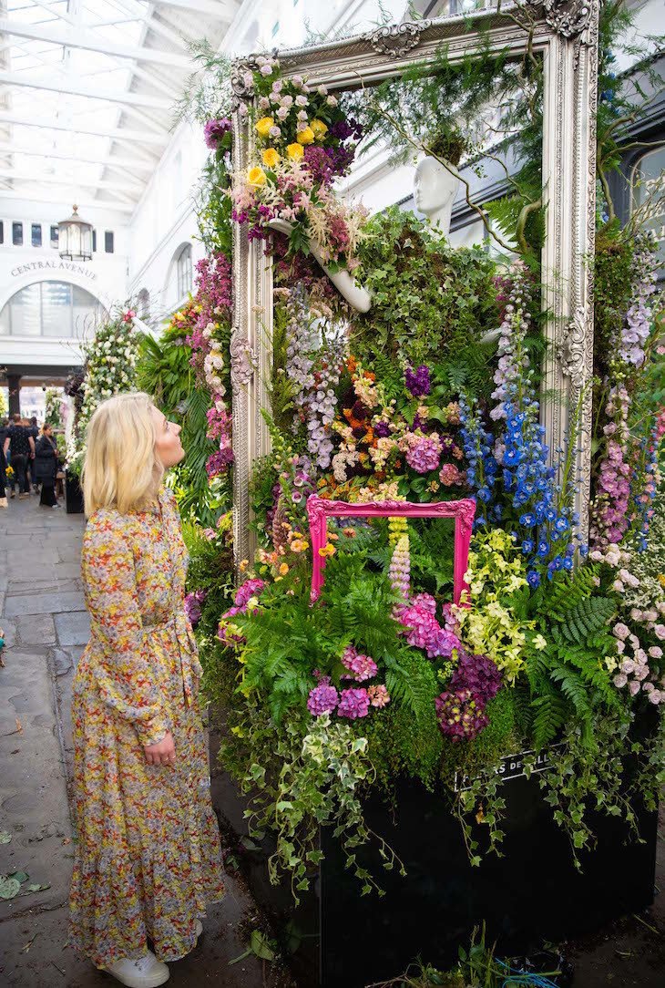 12 gorgeous dresses made from flowers have appeared in covent garden