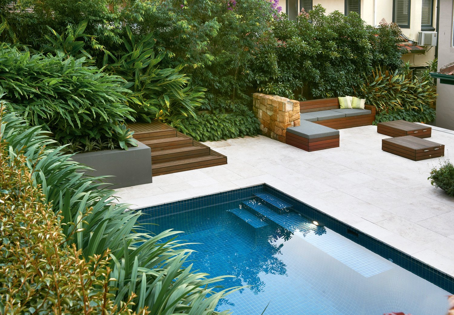 simply stylish: a classic pool and landscape design - completehome