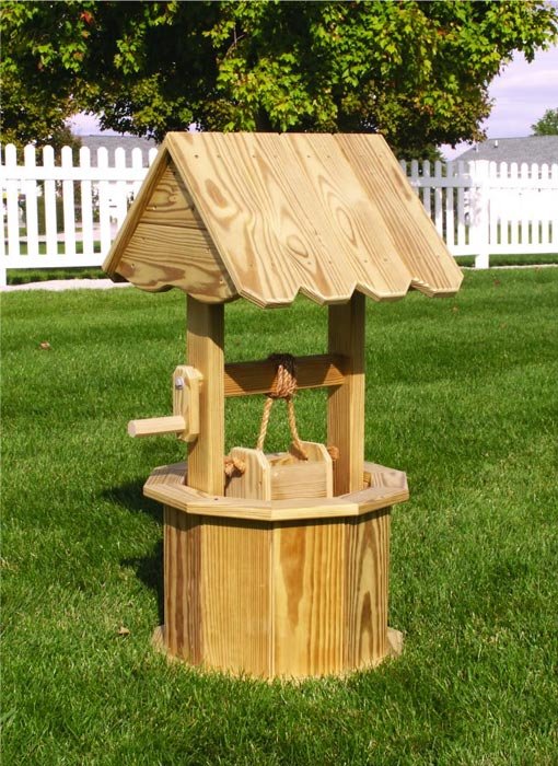 wooden wishing well: whimsical garden attribute
