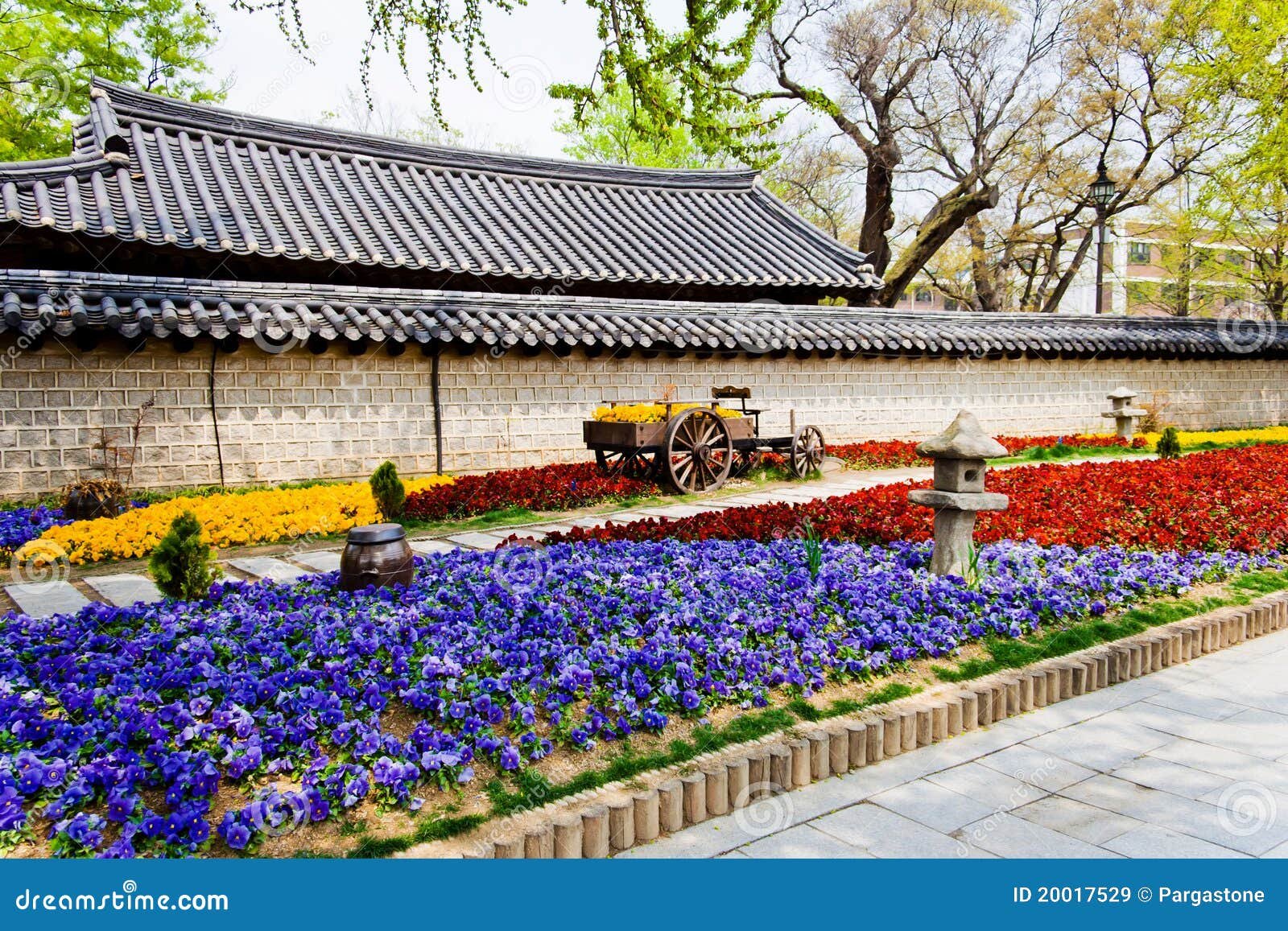 beautiful flowers in front of a korean temple stock image - image of